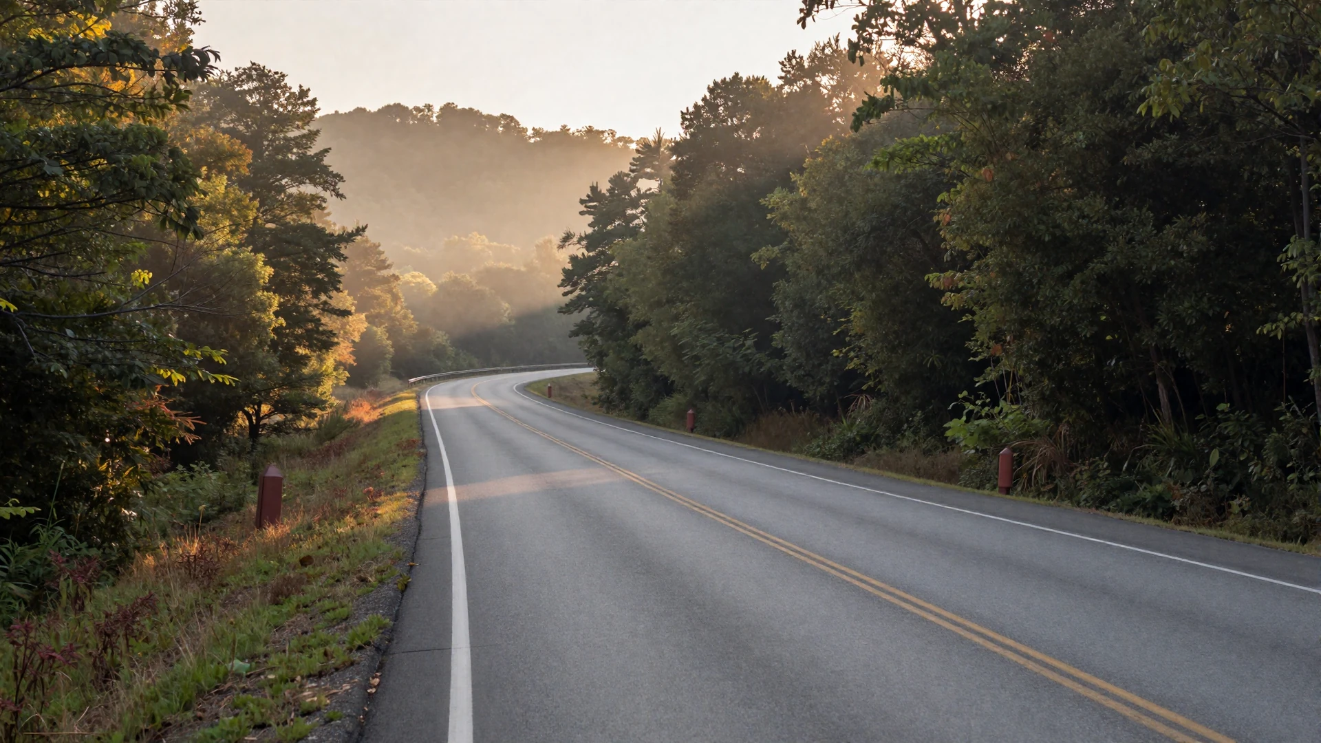 I-40 highway through the Arkansas Ozarks at dawn - trucker dating Arkansas hero background